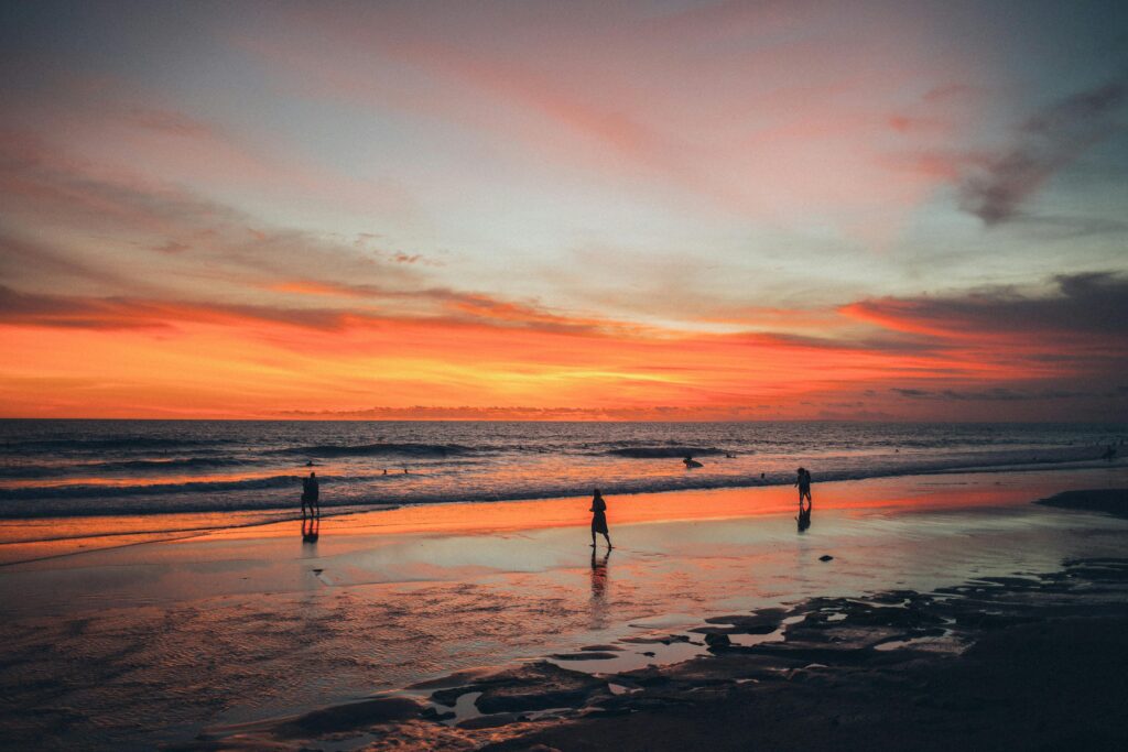 Romantic spots on a European beach at sunset, perfect for a European honeymoon